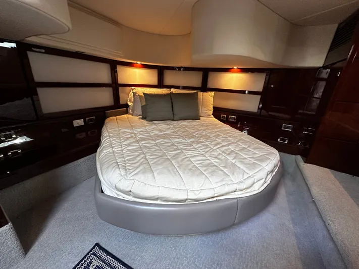Incentive Yacht Photos Pics Luxurious bedroom interior of 2008 Sea Ray 47 Sedan Bridge yacht with cozy bedding.