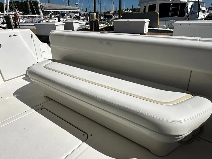 Incentive Yacht Photos Pics White seating area on 2008 Sea Ray 47 Sedan Bridge yacht at marina.