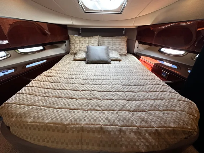Incentive Yacht Photos Pics Luxurious bedroom interior of 2008 Sea Ray 47 Sedan Bridge yacht with elegant bedding.