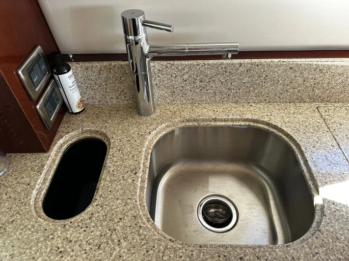 Incentive Yacht Photos Pics Kitchen sink and faucet on 2008 Sea Ray 47 Sedan Bridge yacht.