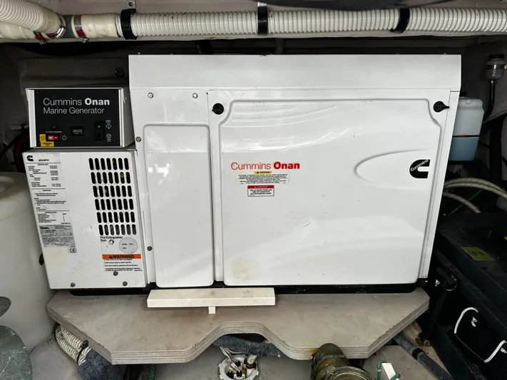 Incentive Yacht Photos Pics Cummins Onan marine generator in 2008 Sea Ray 47 Sedan Bridge engine room.