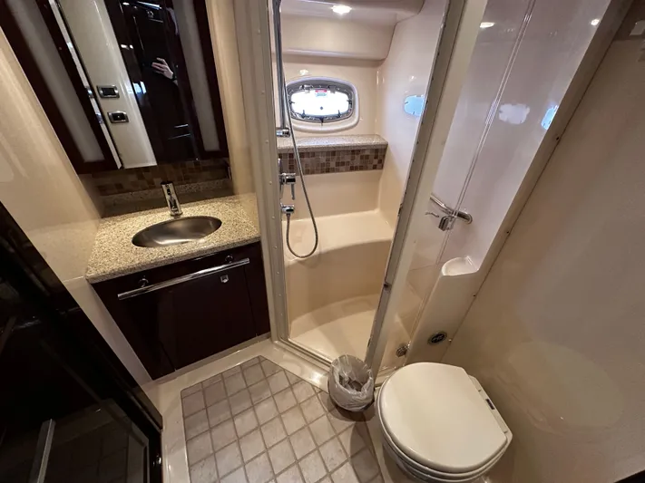 Incentive Yacht Photos Pics Luxurious bathroom in 2008 Sea Ray 47 Sedan Bridge yacht with shower and sink.