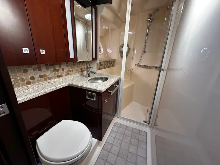 Incentive Yacht Photos Pics Luxurious bathroom in 2008 Sea Ray 47 Sedan Bridge yacht with modern fixtures and shower.