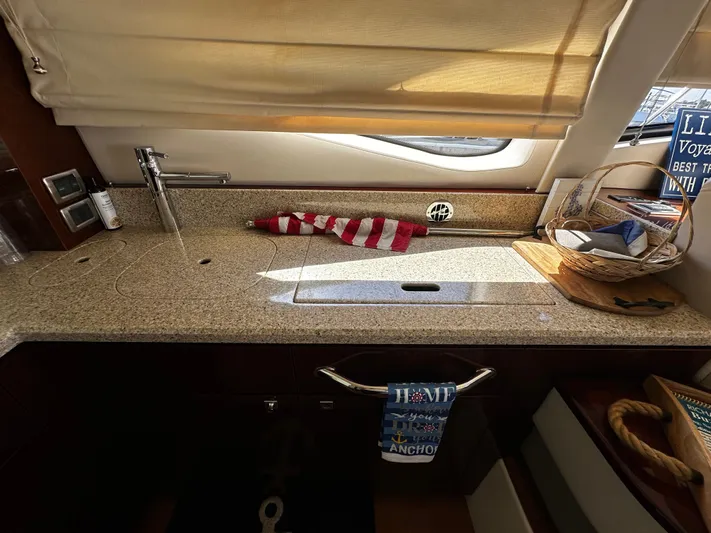 Incentive Yacht Photos Pics Luxurious kitchen area in 2008 Sea Ray 47 Sedan Bridge yacht.