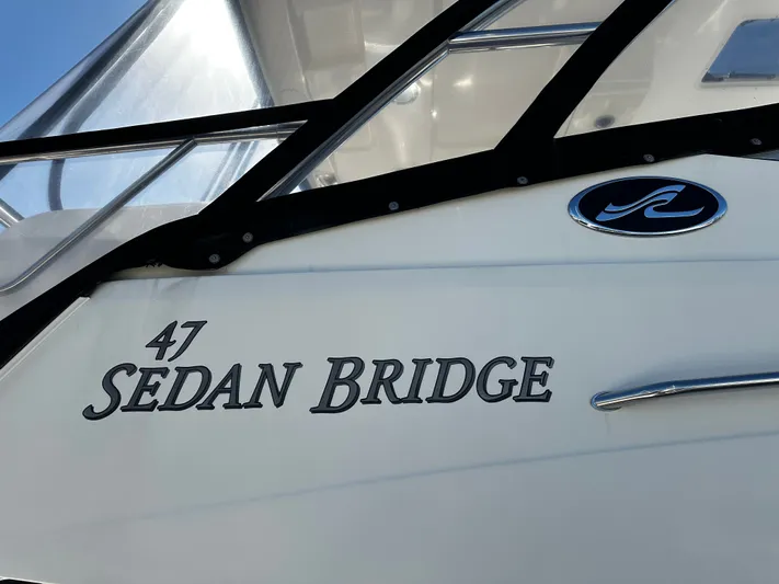Incentive Yacht Photos Pics 2008 Sea Ray 47 Sedan Bridge yacht exterior with logo and model name.