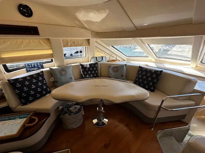 Incentive Yacht Photos Pics Luxurious interior of 2008 Sea Ray 47 Sedan Bridge with nautical-themed decor.