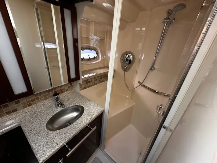 Incentive Yacht Photos Pics Luxurious bathroom in 2008 Sea Ray 47 Sedan Bridge yacht with modern fixtures and shower.
