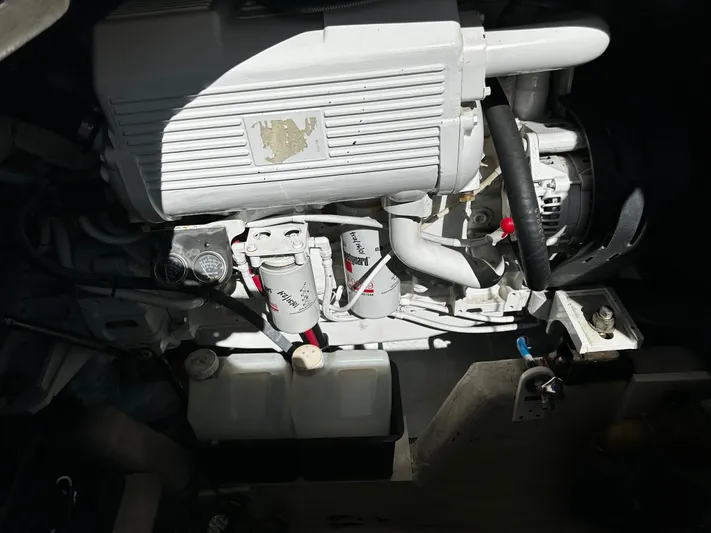 Incentive Yacht Photos Pics Engine compartment of a 2008 Sea Ray 47 Sedan Bridge, showcasing mechanical components.