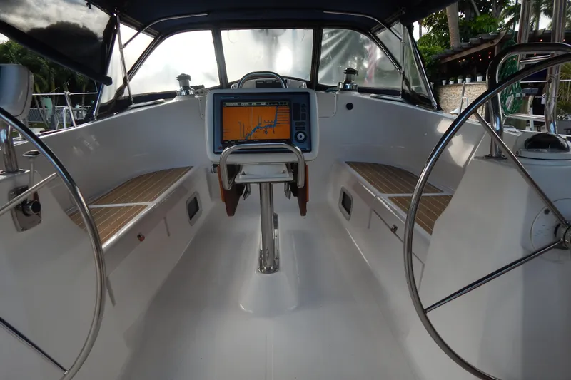  Yacht Photos Pics 2010 Hunter Sailing Diver cockpit with dual steering wheels and navigation display.