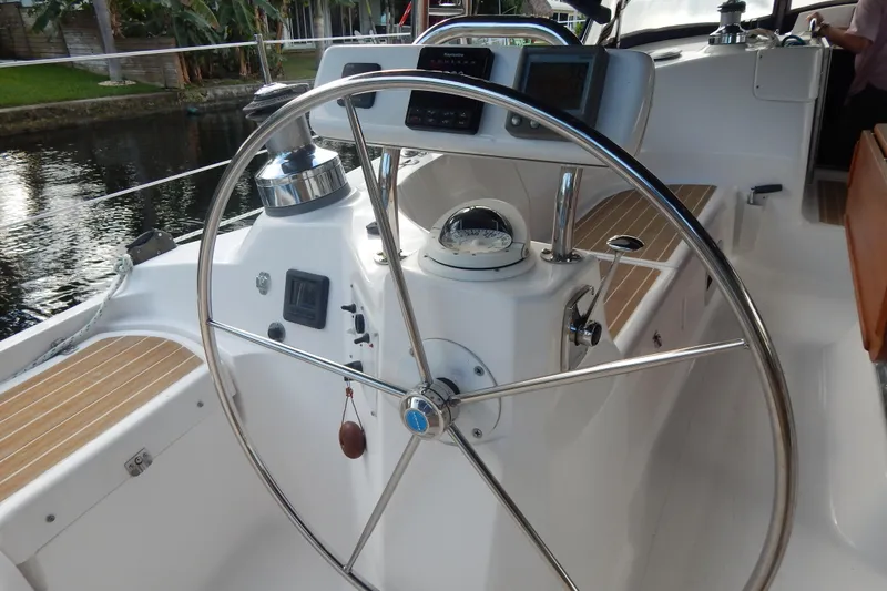  Yacht Photos Pics Steering wheel of 2010 Hunter Sailing Diver yacht with navigation instruments.