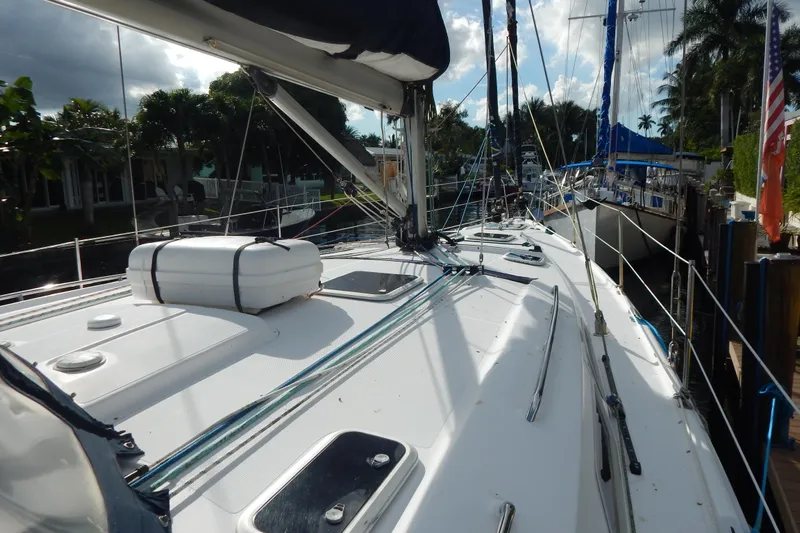  Yacht Photos Pics 2010 Hunter Sailing Diver yacht docked, featuring sleek deck design and rigging.