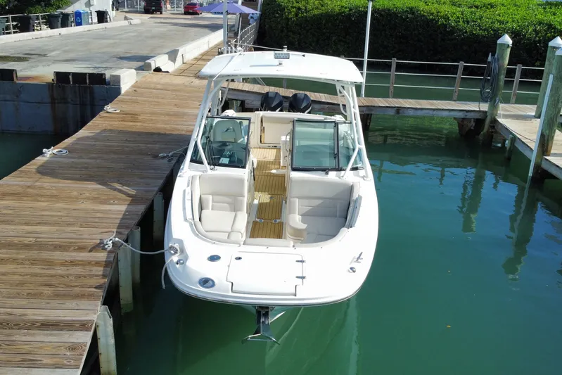  Yacht Photos Pics 2019 Boston Whaler 270 Vantage docked at marina, aerial view.