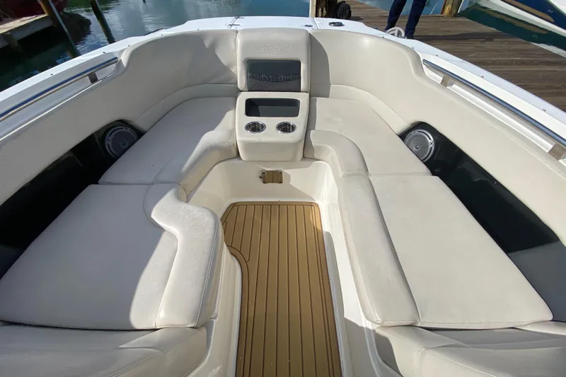  Yacht Photos Pics 2019 Boston Whaler 270 Vantage boat interior with cushioned seating and cup holders.