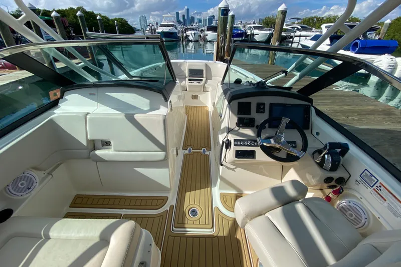  Yacht Photos Pics Interior view of 2019 Boston Whaler 270 Vantage boat at marina dock.