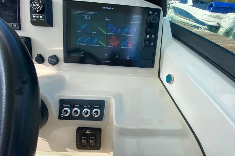  Yacht Photos Pics 2019 Boston Whaler 270 Vantage dashboard with Raymarine navigation system and control panel.