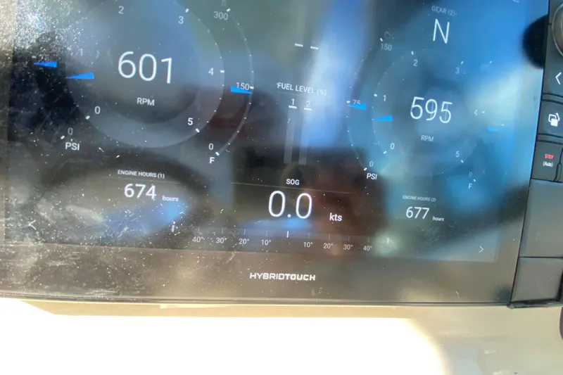  Yacht Photos Pics Digital display of a 2019 Boston Whaler 270 Vantage showing engine metrics and navigation data.