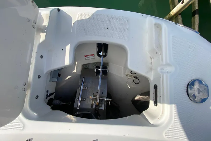  Yacht Photos Pics 2019 Boston Whaler 270 Vantage anchor compartment, showcasing clean design and functionality.