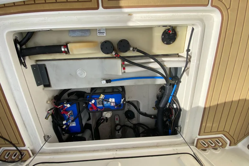  Yacht Photos Pics 2019 Boston Whaler 270 Vantage engine compartment with wiring and components visible.