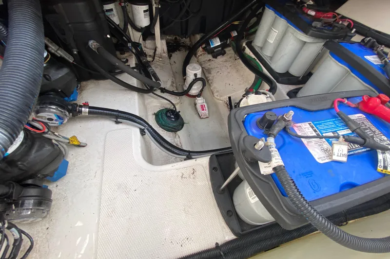  Yacht Photos Pics Engine compartment of a 2019 Boston Whaler 270 Vantage with visible batteries and wiring.
