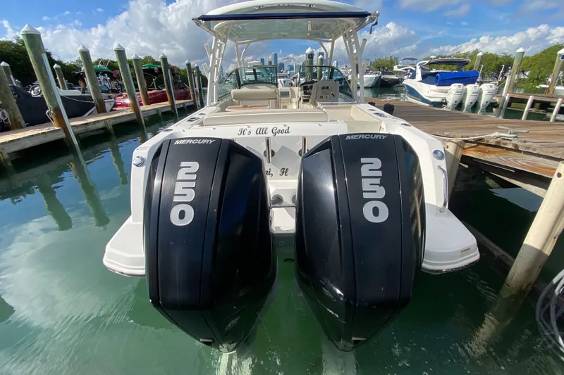  Yacht Photos Pics 2019 Boston Whaler 270 Vantage with twin Mercury 250 engines docked at marina.
