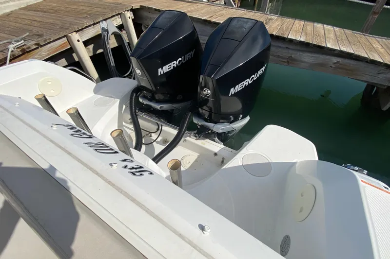  Yacht Photos Pics 2019 Boston Whaler 270 Vantage with dual Mercury outboard engines docked.