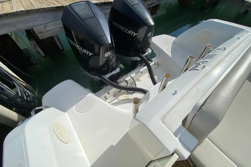  Yacht Photos Pics 2019 Boston Whaler 270 Vantage with dual Mercury outboard engines at dock.