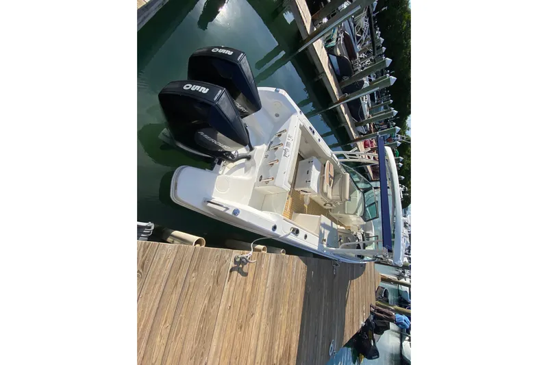  Yacht Photos Pics 2019 Boston Whaler 270 Vantage docked with dual engines, viewed from above.