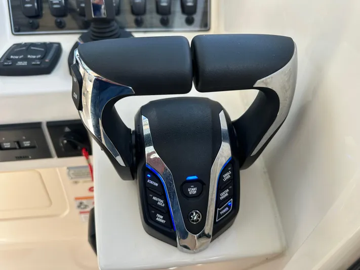  Yacht Photos Pics Throttle controls on a 2024 Grady-White Freedom 285 boat dashboard.