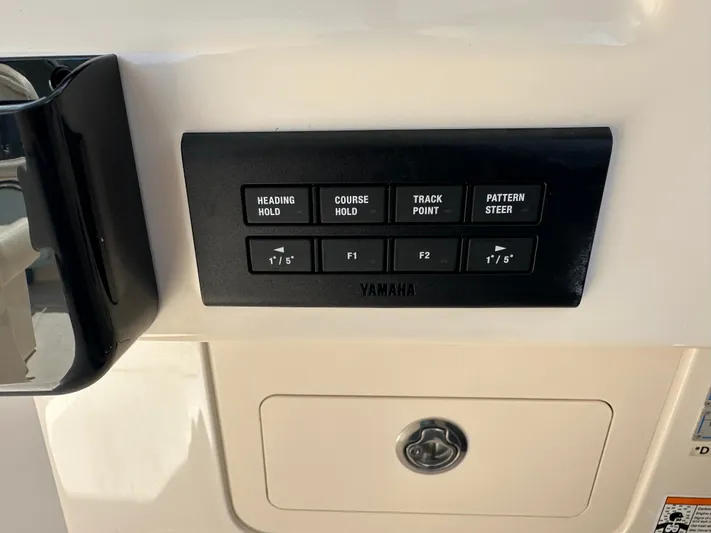  Yacht Photos Pics Control panel of 2024 Grady-White Freedom 285 boat with Yamaha navigation buttons.