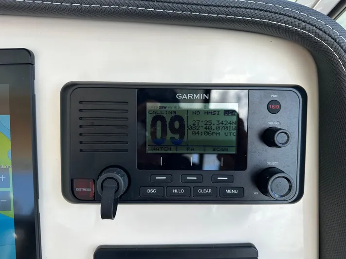  Yacht Photos Pics Garmin marine radio on 2024 Grady-White Freedom 285 boat dashboard.