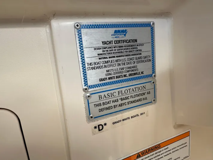  Yacht Photos Pics Yacht certification plaque on 2024 Grady-White Freedom 285, detailing safety and flotation standards.