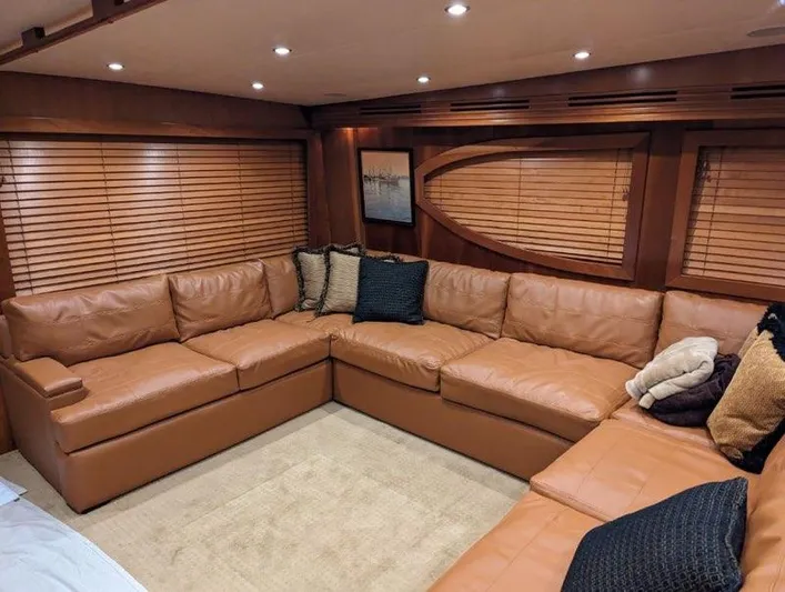 Yacht Photos Pics Luxurious leather seating in the 2007 Hatteras 68 Convertible yacht interior.