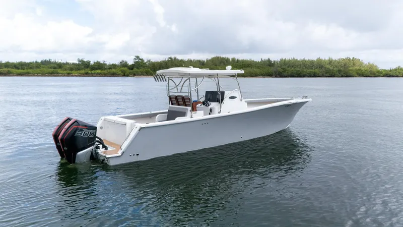  Yacht Photos Pics 2023 Seahorse 36 CC boat on calm water, featuring sleek design and powerful engine.