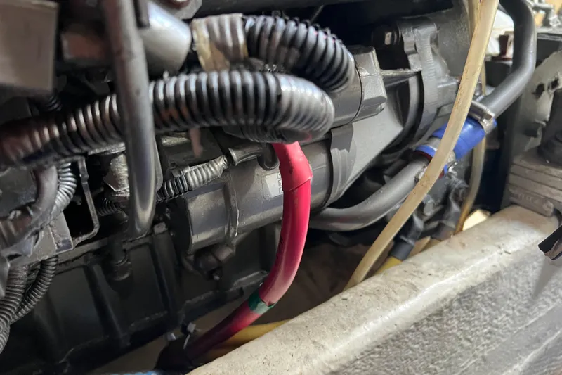  Yacht Photos Pics Engine components of a 2008 Luhrs 35 Convertible boat, featuring wiring and hoses.