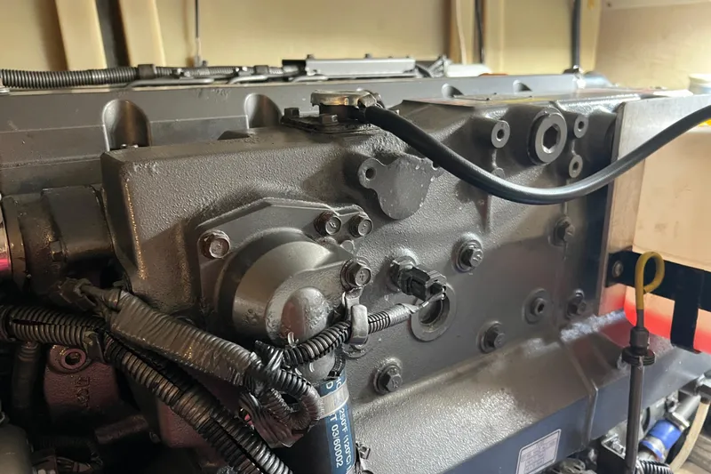  Yacht Photos Pics Engine compartment of a 2008 Luhrs 35 Convertible boat, showcasing mechanical components and wiring.