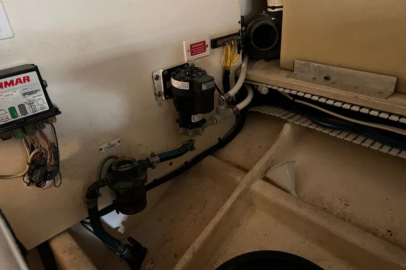  Yacht Photos Pics Engine room of 2008 Luhrs 35 Convertible boat, showing electrical and plumbing components.