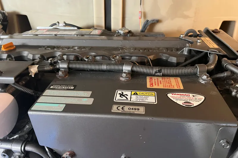  Yacht Photos Pics Engine compartment of a 2008 Luhrs 35 Convertible boat, featuring Yanmar components.