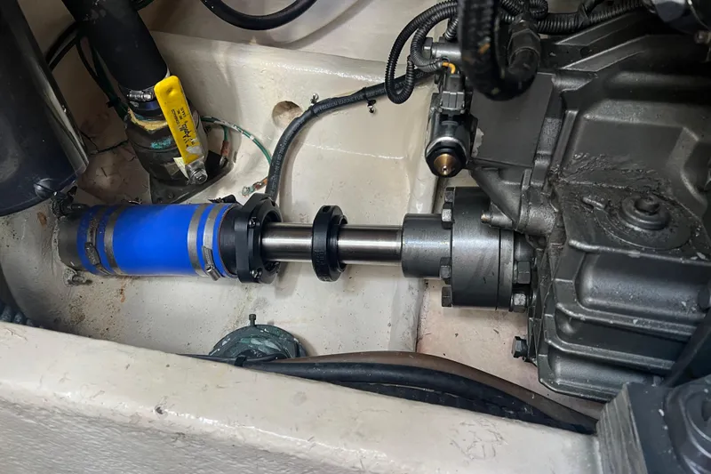  Yacht Photos Pics Engine compartment of 2008 Luhrs 35 Convertible boat, showing mechanical components and wiring.