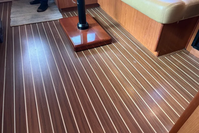  Yacht Photos Pics Luhrs 35 Convertible 2008 interior with polished wood flooring and cushioned seating.