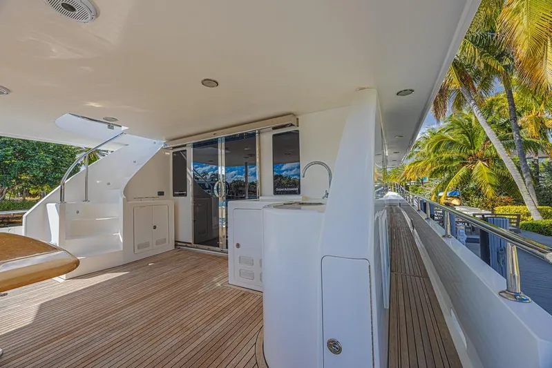 Margarita Yacht Photos Pics Spacious deck of 2010 Ocean Alexander 74 Motoryacht with tropical palm view.