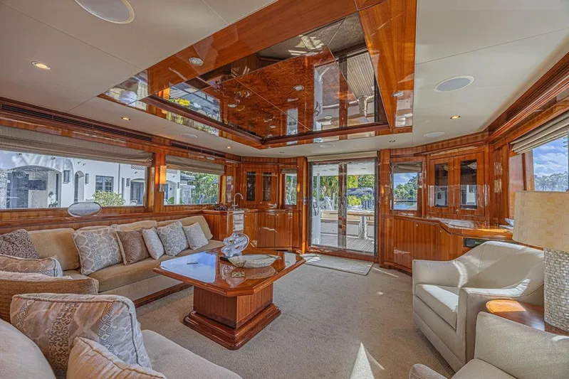 Margarita Yacht Photos Pics Luxurious interior of 2010 Ocean Alexander 74 Motoryacht with elegant wood finishes and plush seating.