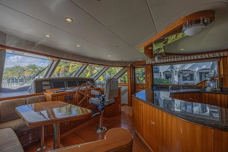 Margarita Yacht Photos Pics Luxurious interior of 2010 Ocean Alexander 74 Motoryacht with elegant wood finishes and panoramic windows.