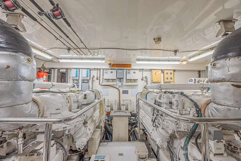 Margarita Yacht Photos Pics Engine room of 2010 Ocean Alexander 74 Motoryacht, featuring dual engines and control systems.