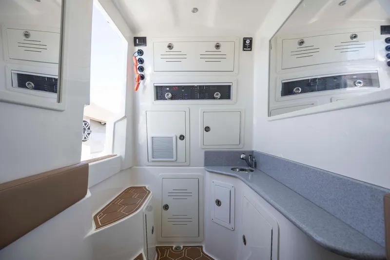  Yacht Photos Pics Interior of 2020 Blackwater 41 Tournament boat with cabinets and sink.