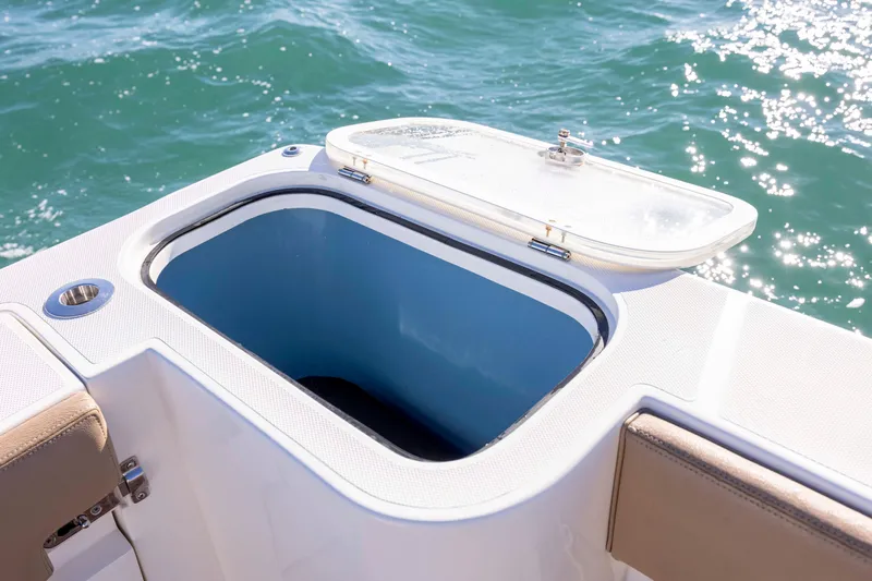  Yacht Photos Pics Open storage compartment on 2020 Blackwater 41 Tournament boat, with ocean background.