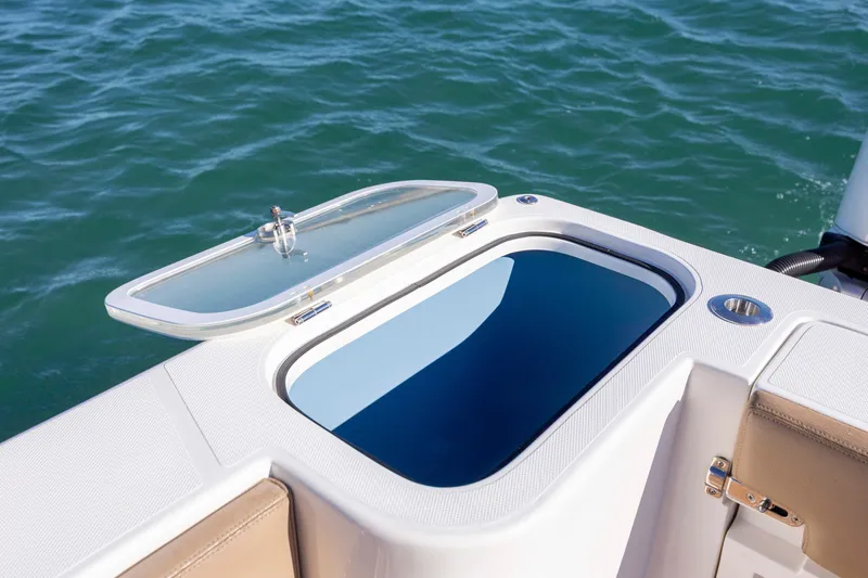  Yacht Photos Pics Open hatch on 2020 Blackwater 41 Tournament boat, revealing storage compartment.