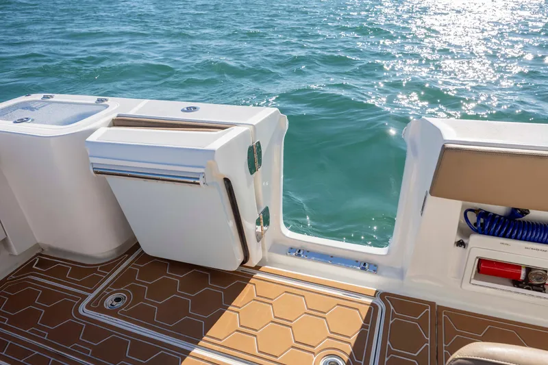  Yacht Photos Pics 2020 Blackwater 41 Tournament boat deck with ocean view and fishing equipment.