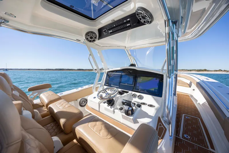  Yacht Photos Pics Interior view of 2020 Blackwater 41 Tournament boat with luxurious seating and advanced navigation system.