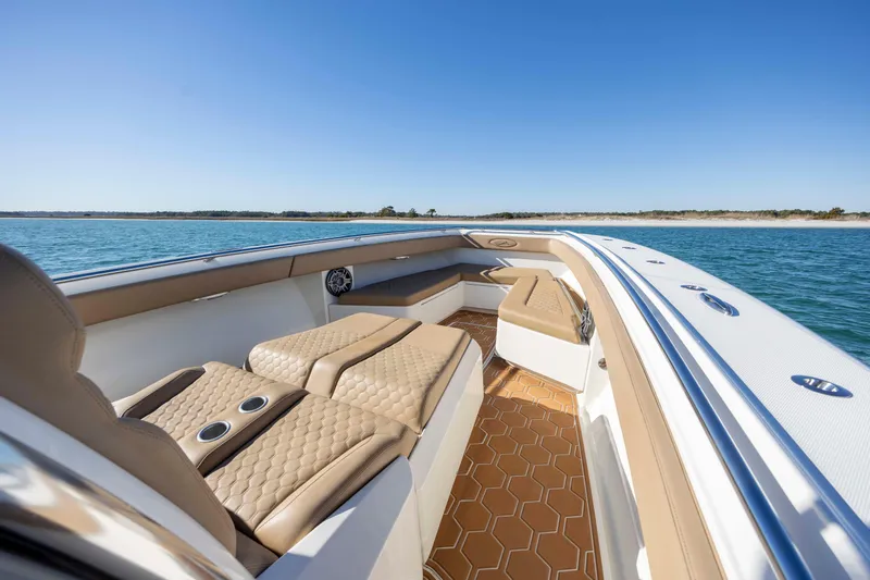  Yacht Photos Pics 2020 Blackwater 41 Tournament boat interior with tan seating on open water.