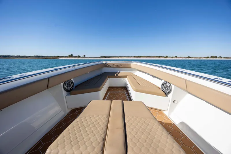  Yacht Photos Pics 2020 Blackwater 41 Tournament boat interior with tan seating and ocean view.